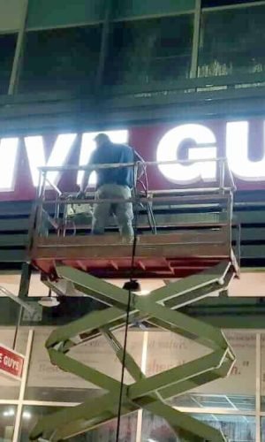 Pressure washing service for commercial buildings in California.