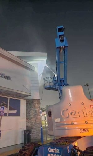 Pressure washing machine cleaning exterior surfaces in California.